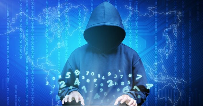 Computer hacker silhouette of hooded man